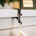 Brown stocking holder for mantle in use Thumbnail | Christmas World