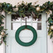 Door Saver™ - Door Protecting Wreath Pad dispalyed on door Thumbnail | Christmas World